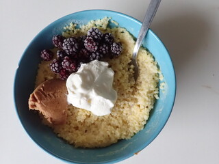 sweet porrifge with fruit and cream