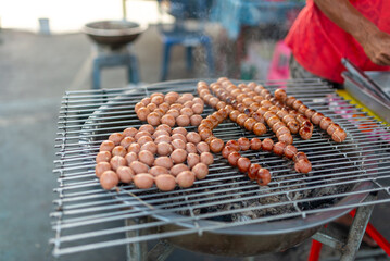 Grilled sausages on the street in Thailand, Asia.