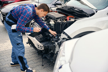 Male on vehicle examination, identification of broken parts