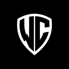 WC monogram logo with bold letters shield shape with black and white color design