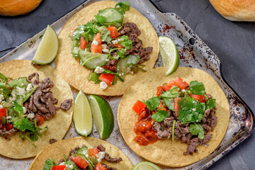 Close-Up 4K Ultra HD Image of Corn Tostada with Beef and Tomato - Stock Photography