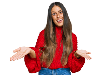 Beautiful hispanic woman wearing casual clothes smiling cheerful with open arms as friendly welcome, positive and confident greetings