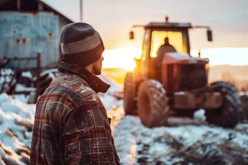 Fototapeten Farmer looking at sunset with tractor © kossovskiy