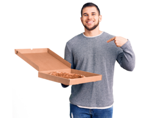 Young handsome man holding delivery italian pizza pointing finger to one self smiling happy and proud