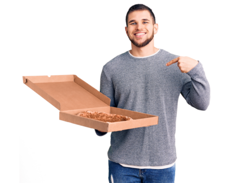 Young handsome man holding delivery italian pizza pointing finger to one self smiling happy and proud