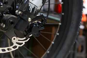Bicycle front hydraulic disc brake caliper close up