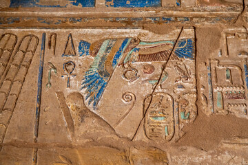Remnants of Brilliantly Painted Ceremonial Hieroglyphs and Carvings of Pharaohs on the Walls of the Karnak Temple Complex, Luxor, Egypt - 765934213