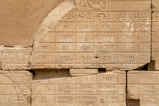 Hieroglyph Numbers Carved on a Stone Wall in Karnak Temple Complex, Luxor, Egypt