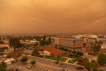 Thick Haze of Orange Smoke Laden Skies Over Redwood City California as a Result of Nearby Wildfires Forest Fires Caused by Climate Change Global Warming and Drought - 765935891