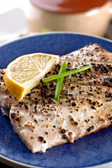 Close-Up 4K Ultra HD Image of Grilled Mahi with Lemon Sauce - Stock Photography