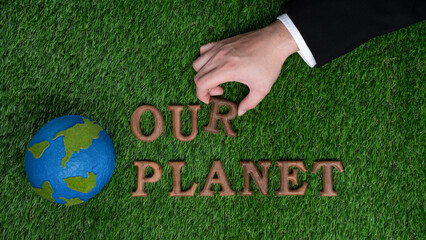 Eco awareness campaign for Earth day concept showcase message arranged in Save Earth on biophilic...