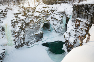 Frozen waterfalls in the Abiskojakka gorge in Abisko National Park, northern Sweden