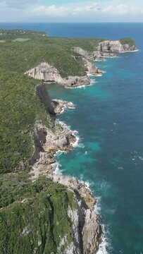 Aerial video over cliffs on the Bamari Galante coastline