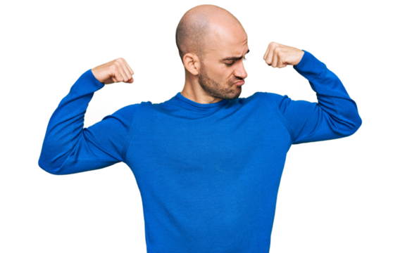 Young hispanic man wearing casual clothes showing arms muscles smiling proud. fitness concept.