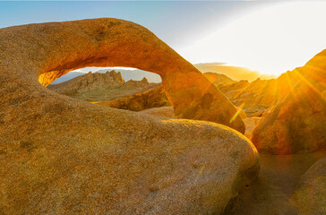 Sunrise Over The Inyo Mountains and  Mobius Arch at Alabama Hills National Scenic Area, California, USA