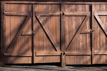 Hand made wooden doors outdoors - weatherd wood detail