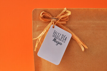 Card in envelope corner with congratulations for International Women's Day