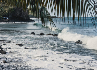 Waves crashing onto the beach at Little Bay, Montserrat, Caribbean  