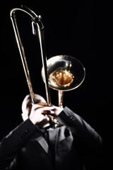 Trombone player. Trombonist playing jazz musician - 765960205