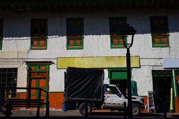 View of the houses around the central square of the beautiful small town of Pacora in Colombia