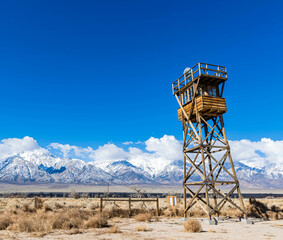 Wooden Guard Tower and The Snow Covered Sierra Nevada Mountains, Manzanar National Historical Site, California, USA