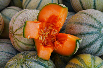 Cantaloupe melons for sale at a French farmers market - 765971412