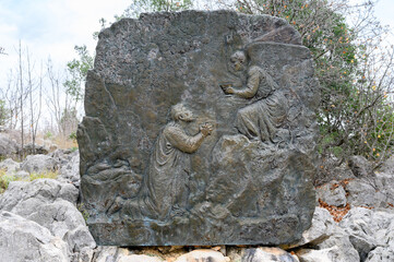 The Agony of Jesus in the Garden – First Sorrowful Mystery of the Rosary. A relief sculpture on Mount Podbrdo (the Hill of Apparitions) in Medjugorje.
