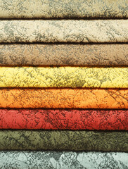 Upholstery textile materials variety selection of designs and colors. Design clothes concept idea. Modern and classic cloth samples 