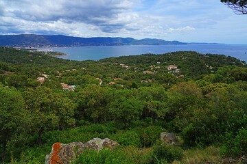 View of the landscape in Cap Benat, a cape on the Mediterranean Sea in Bormes-les-Mimosas near Le Lavandou on the French Riviera Cote d’Azur - 765980611