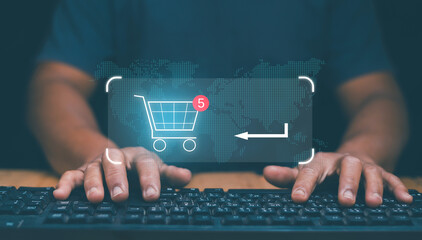 Ecommerce and online shopping concept, Businessman use computer for online shopping on internet network and select product to shopping cart. Global network online marketplace. - obrazy, fototapety, plakaty