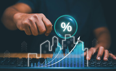 Profit assessment for investment in real estate business. Businessman using magnifying glass for...