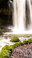 Obraz premium Close up of a waterfall in the forest