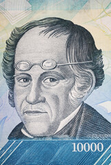 Portrait of Philosopher and educator Simon Rodriguez on Venezuela 10000 Bolivar currency banknote (focus on center)