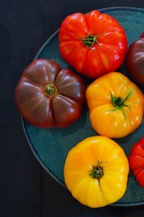 Bowl of colorful heirloom tomatoes in Provence, France - 765994003