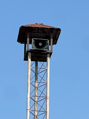 speaker tower on blue sky