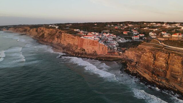 Aerial View of Azenhas do Mar Town in Portugal on Steep Cliffs with Wild Sea.