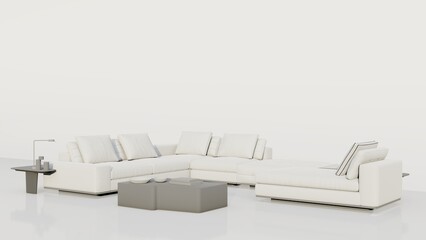 A white couch is placed in front of a white wall