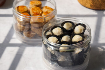 Popular cookies in Malaysia during celebration of Eid Mubarak (Hari Raya) on white background and selective focus.