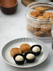 Popular cookies in Malaysia during celebration of Eid Mubarak (Hari Raya) on white background and selective focus.