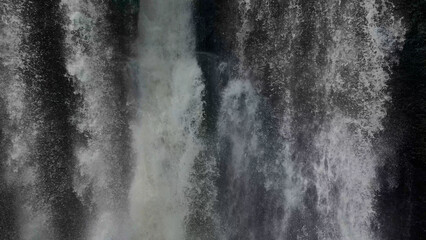 Waterfall cascading on cliffside