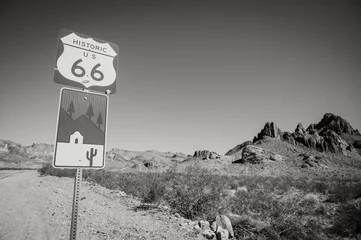 Tuinposter Historic Route 66 sign along Highway 10 in Arizona, USA.  Black and white image. © David