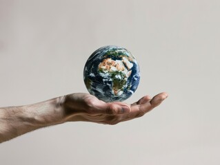 Holding the World: A hand cradles a delicate globe, symbolizing responsibility, care, and the interconnectedness of life. The image evokes feelings of hope, protection, and the fragility of our planet