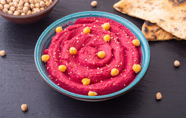 Declicious food from chickpea - beetroot hummus - 766022847