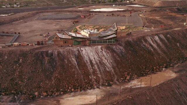 Line of Lode memorial on hilltop of Broken Hill city in Australia &ndash; aerial sunrise 4k.
