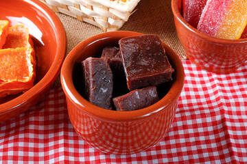 guava jam or mariola in ceramic bowl. Traditional sweet from Brazilian country festivals