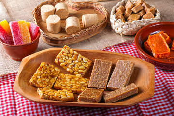 Table with Brazilian sweets and traditional country festival desserts