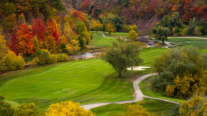 Aerial View of a Golf Course in Fall Foliage, autumn golf course