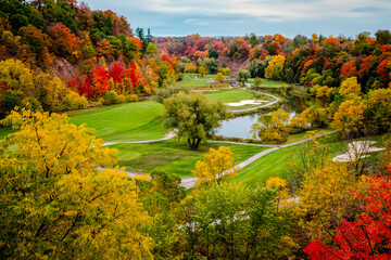 Aerial View of a Golf Course in Fall Foliage, autumn golf course