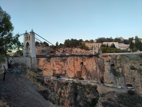 the famous suspension bridge, or footbridge of Sidi M Cid and the road which crosses the caves below at sunset, this bridge crosses the gorges at 175 meters above the Rhumel. Constantine, Algeria