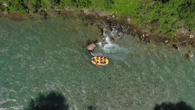 Aerial top view of rafting boats on turquoise mountain river. Tara river canyon in Montenegro, 4k
